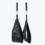 A pair of black padded ab straps with metal carabiners hanging vertically against a white background.