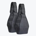 A pair of black padded ab hanging straps with wide arm supports and velcro loop attachments, isolated on a white background.