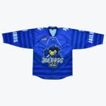 A blue hockey jersey with a cartoon bird mascot and the text Jailbirds on the front and sleeves.
