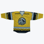 A yellow hockey jersey with a cartoon dump truck logo on the front, hazard stripes on the sleeves and hem, and the number 6 on the shoulders.