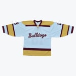 A light blue, gold, and maroon hockey jersey with 'Bulldogs' written across the front.