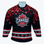 A black long-sleeved hockey jersey with a red maple leaf logo reading CANADA INLINE on the chest, featuring red maple leaf patterns on the shoulders and striped borders on the hem and cuffs.