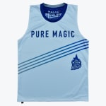 A light blue sleeveless athletic jersey with PURE MAGIC written in dark blue on the chest, diagonal blue stripes, and a Hakro Merlins Crailsheim wizard logo on the bottom right.