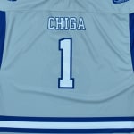 The back of a light blue sports jersey featuring the name CHIGA and the number 1 in white with dark blue outlines.