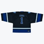 The back of a black hockey jersey with CHIGA and the number 1 printed in blue and white. It features blue and white stripes on the sleeves and hem.