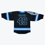 Back view of a black hockey jersey with BIALEK and 49 printed in blue and white, featuring wing graphics on the shoulder and striped accents.