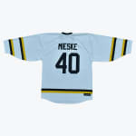 Back of a white hockey jersey with 'MIESKE' and '40' in black, featuring yellow and black stripes on the sleeves and hem.