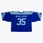 The back of a royal blue sports jersey with the name McGillivray and the number 35 in light blue.