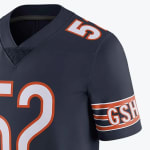 Close-up of a navy blue Chicago Bears jersey featuring the number 52 on the front and shoulder, and the GSH initials on the sleeve stripe.