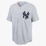A white New York Yankees baseball jersey with navy blue pinstripes and the interlocking NY logo on the left chest.