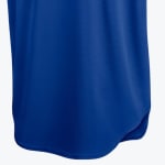 Close-up of a royal blue athletic jersey curved bottom hem against a white background.