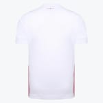 The back view of a white athletic t-shirt with a small red cross on the collar and red side stripes.