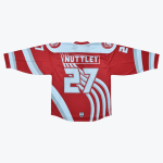 The back of a red hockey jersey with NUTTLEY and the number 27 printed in white and grey, accented by wavy white and light blue stripes.