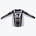Back view of a black and white motocross jersey with J. AGUIAR and the number 57 printed on the back.