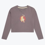 A long-sleeved cropped t-shirt in muted purple-grey with a central graphic of a yellow tiger on a red circular background, shown flat against a white backdrop.