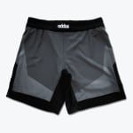 A pair of gray and black athletic shorts with a color-blocked geometric pattern and a black waistband featuring a white logo.