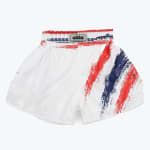 A pair of white Muay Thai shorts with red and blue brushstroke designs on the left side and waistband, featuring an addos brand label in the center.