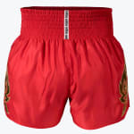 Front view of red satin Addos Muay Thai shorts with a thick elastic waistband and gold embroidery on the sides, set against a white background.