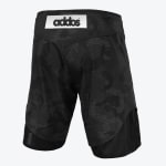 Back view of black Addos grappling shorts with a dark camouflage pattern, a white logo patch on the waistband, and black stretch panels at the hem.