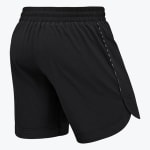 Back view of black athletic shorts with an elastic waistband and curved side slits.