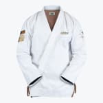 Front view of a white Addos Jiu-Jitsu gi jacket with gold embroidery and brown lining on a plain white background.