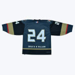 The back of a dark teal hockey jersey with the number 24 and the text DAVES A KILLER! printed below it.
