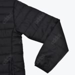 Close-up of a black quilted puffer jacket sleeve.