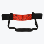 A red and black splatter-patterned arm blaster with padded elbow rests and an adjustable neck strap, isolated on a white background.
