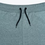 Close-up of a grey heathered sweatpants waistband with black drawstrings.