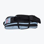 An open light blue and black Addos sports duffel bag featuring a customized name tag on the side pocket.