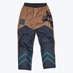 A pair of tan and grey Addos athletic pants featuring a Florida Panthers logo on the thigh and teal chevron stripes at the bottom.