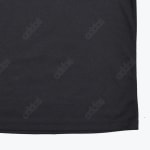 Close-up of black fabric featuring a subtle, repeating diagonal pattern of the Addos logo.