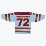 The back of a white hockey jersey with CRISTODERO and 72 in maroon and orange lettering. The jersey features maroon shoulders and striped patterns on the sleeves and hem.