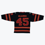 The back of a black sports jersey with the name BLASKI and the number 45 in red and orange, featuring striped sleeves and hem.
