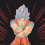 A graphic print of Goku in Super Saiyan Blue form with blue hair, cupping his hands to fire a Kamehameha wave, set against a black background with red speed lines.