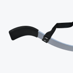 Close-up of a silver-grey metal arm blaster showing its curved end with black foam padding and a black nylon strap.