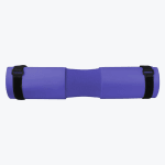 A purple foam barbell pad with an ergonomic neck groove and two black securing straps, isolated on a white background.