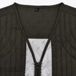Close-up of an olive green quilted vest showing the V-neck, size L label, open zipper, and white mesh lining.