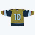 Back view of a gold and navy hockey jersey with the number 10 and the text DAVE A KILLER! printed on the back.