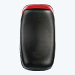 A curved black martial arts kick pad with a red top, shown from the front against a solid white background.