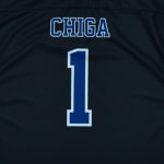 The back of a navy blue sports jersey featuring the name CHIGA and the number 1 in blue with white outlines.