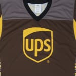 A brown sleeveless jersey with grey shoulder panels and a prominent yellow UPS logo on the chest.