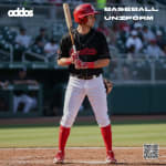 A baseball player in a black and red uniform holding a bat at home plate, with BASEBALL UNIFORM text and a QR code on the image.
