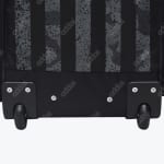 Close-up of the bottom wheels and striped fabric of a black Addos wheeled bag.