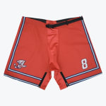Red Cincinnati Cyclones hockey shell shorts with number 8 on the left leg and team logo on the right leg, featuring a black belt and zippered inner thighs.