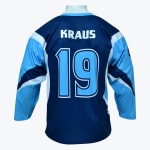 Back view of a dark and light blue hockey jersey featuring the name KRAUS and number 19 in white and light blue text.