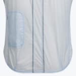 Close-up of the back of a light blue translucent cycling vest featuring two vertical reflective strips and a zippered side pocket.