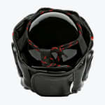 Top view of a black boxing headgear showing the red and black adjustable top laces and rear velcro strap on a white background.