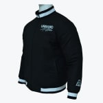 A black zip-up bomber jacket with white stripes on the collar, cuffs, and hem, featuring the URBANO All Stars logo on the chest, shown on a mannequin.