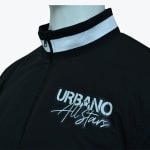 Close-up of a black track jacket with a white-striped collar and the Urbano All Stars logo on the chest, displayed on a mannequin.